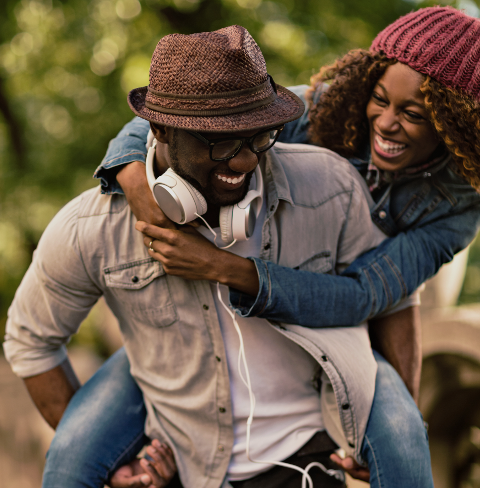 Man giving woman piggyback